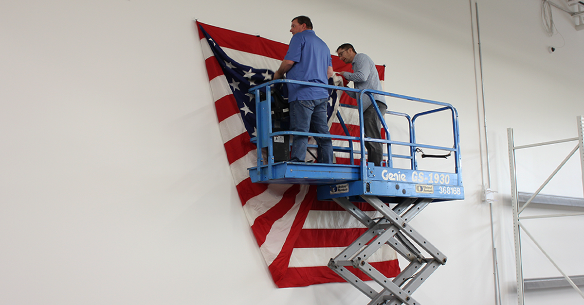 USS Momsen Flag Finds Place of Honor at OpenEye